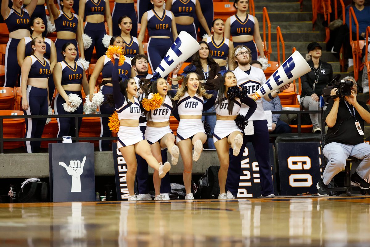 Feb 3, 2024; El Paso, Texas, USA; The UTEP Miners cheerleaders try to distract a Liberty University Flames free throw shooter as the in the second half at Don Haskins Center. Mandatory Credit: Ivan Pierre Aguirre-Imagn Images