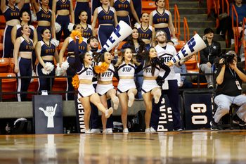 Feb 3, 2024; El Paso, Texas, USA; The UTEP Miners cheerleaders try to distract a Liberty University Flames free throw shooter as the in the second half at Don Haskins Center. Mandatory Credit: Ivan Pierre Aguirre-Imagn Images