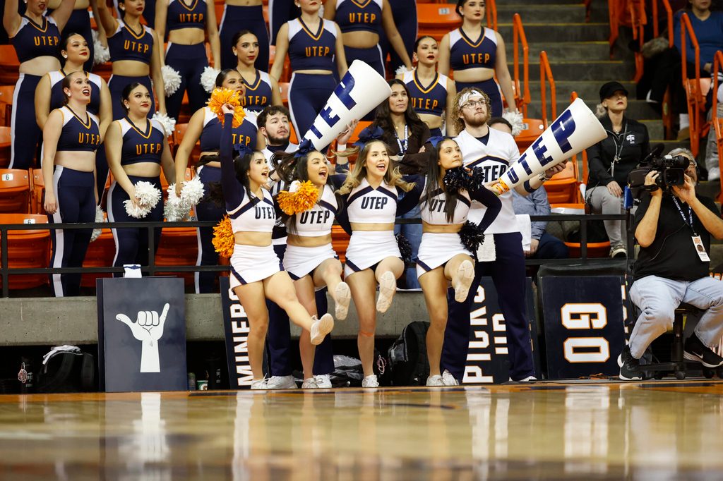 Feb 3, 2024; El Paso, Texas, USA; The UTEP Miners cheerleaders try to distract a Liberty University Flames free throw shooter as the in the second half at Don Haskins Center. Mandatory Credit: Ivan Pierre Aguirre-Imagn Images
