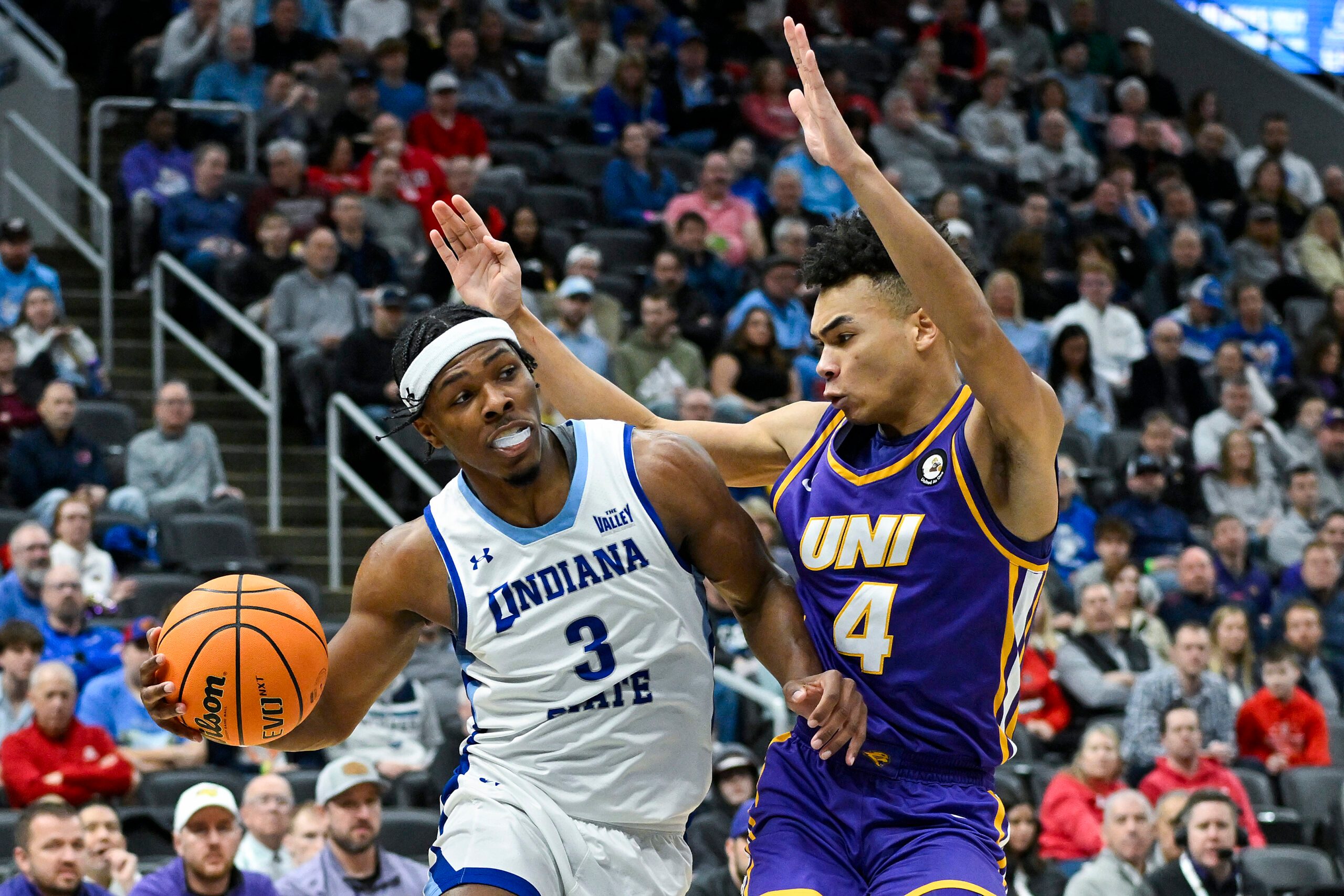 Mar 9, 2024; St. Louis, MO, USA;  Indiana State Sycamores guard Ryan Conwell (3) drives to the basket as Northern Iowa Panthers guard Trey Campbell (4) defends during the first half of the Missouri Valley Conference Tournament semifinal game at Enterprise Center. Mandatory Credit: Jeff Curry-Imagn Images