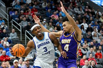 Mar 9, 2024; St. Louis, MO, USA;  Indiana State Sycamores guard Ryan Conwell (3) drives to the basket as Northern Iowa Panthers guard Trey Campbell (4) defends during the first half of the Missouri Valley Conference Tournament semifinal game at Enterprise Center. Mandatory Credit: Jeff Curry-Imagn Images