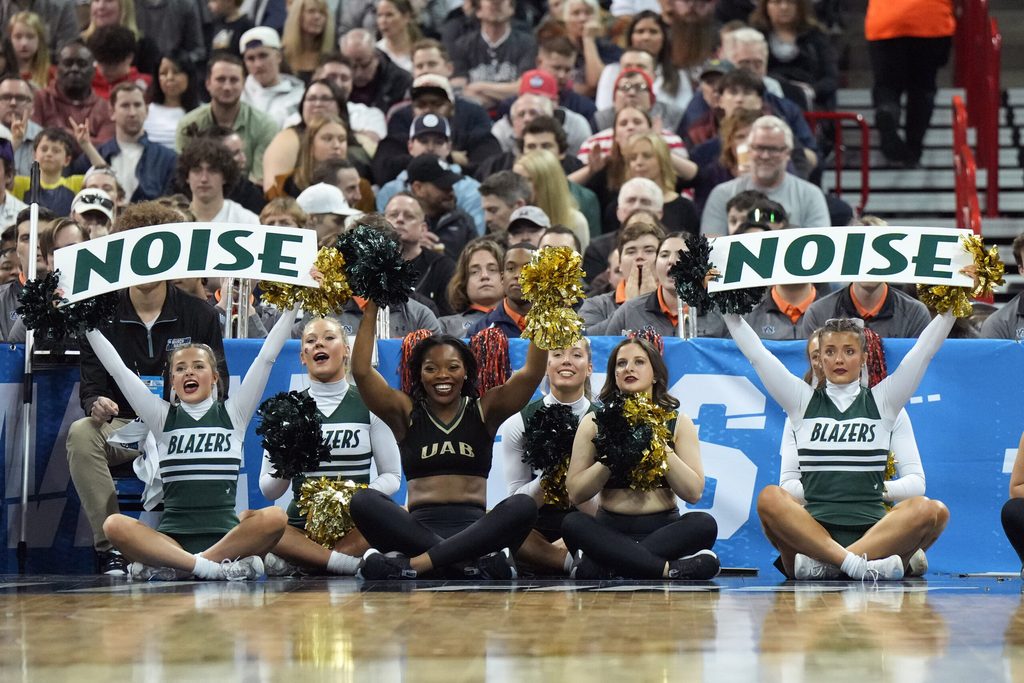 Mar 22, 2024; Spokane, WA, USA; UAB Blazers cheerleaders cheer against the San Diego State Aztecs during the second half in the first round of the 2024 NCAA Tournament at Spokane Veterans Memorial Arena. Mandatory Credit: Kirby Lee-Imagn Images