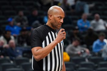 NCAA referee Bert Smith keeps his whistle at the ready Friday, March 22, 2024, during the first round of the NCAA Men’s Basketball Tournament at Gainbridge Fieldhouse in Indianapolis. The Colorado Buffaloes defeated the Florida Gators 102-100.