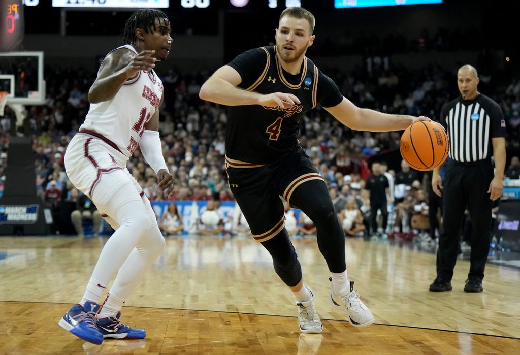 Mar 22, 2024; Spokane, WA, USA; Charleston Cougars guard Bryce Butler (4) dribbles against Alabama Crimson Tide guard Latrell Wrightsell Jr. (12) during the second half in the first round of the 2024 NCAA Tournament at Spokane Veterans Memorial Arena. Mandatory Credit: Kirby Lee-Imagn Images