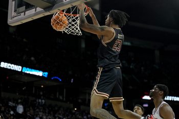 Mar 22, 2024; Spokane, WA, USA; Charleston Cougars forward James Scott (23) dunks during the second half in the first round of the 2024 NCAA Tournament against the Alabama Crimson Tide at Spokane Veterans Memorial Arena. Mandatory Credit: Kirby Lee-Imagn Images