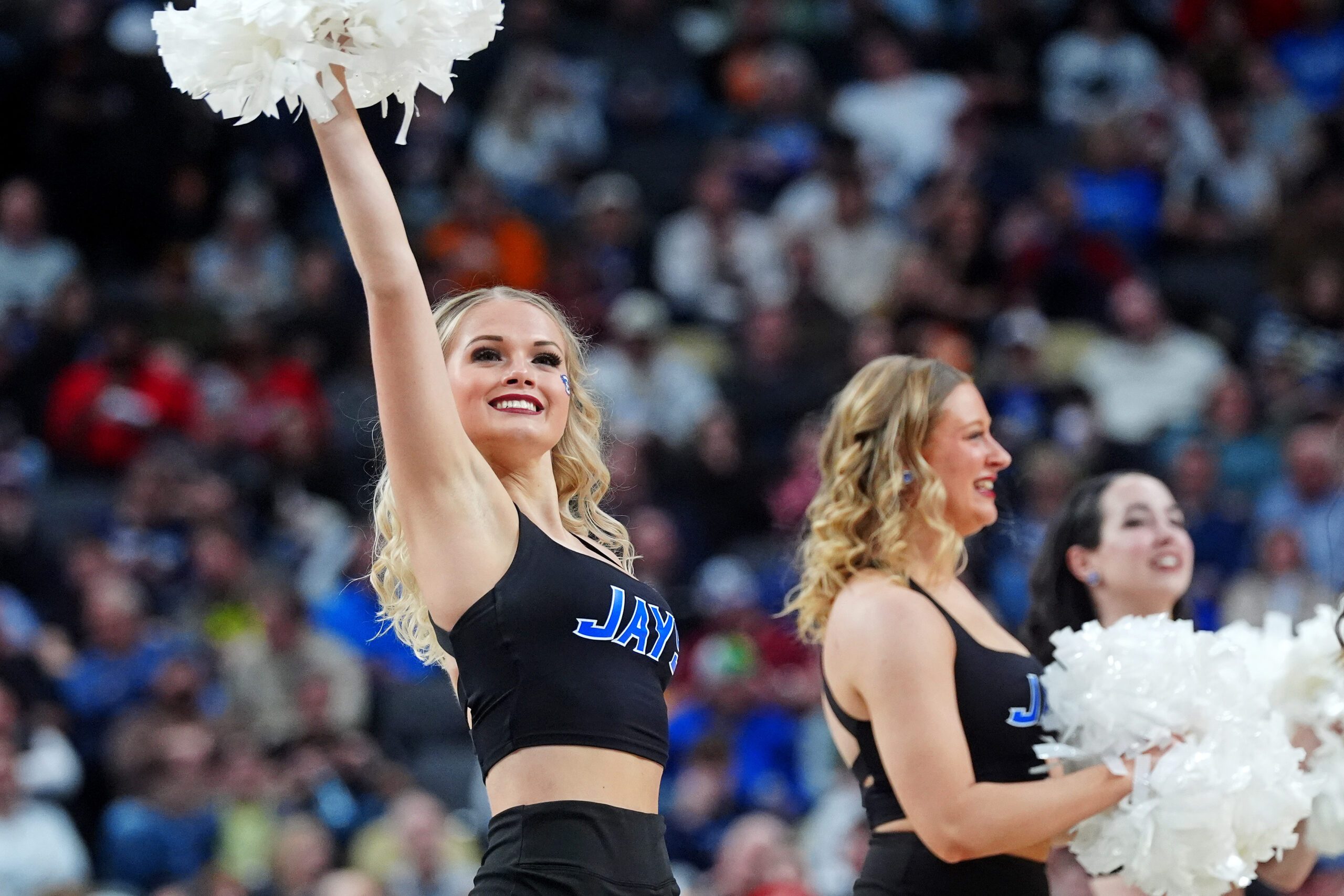 Mar 23, 2024; Pittsburgh, PA, USA; The Creighton Bluejays cheerleaders cheer during a time out of the game between the Oregon Ducks and the Creighton Bluejays in the second round of the 2024 NCAA Tournament at PPG Paints Arena. Mandatory Credit: Gregory Fisher-Imagn Images