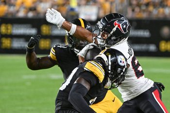 Aug 9, 2024; Pittsburgh, Pennsylvania, USA;  Houston Texans wide receiver Johnny Johnson III (88) runs following a catch as Pittsburgh Steelers linebacker Easton Gibbs defends during the fourth quarter at Acrisure Stadium. Mandatory Credit: Barry Reeger-Imagn Images