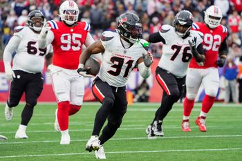Oct 13, 2024; Foxborough, Massachusetts, USA; Houston Texans running back Dameon Pierce (31) runs with the ball for a touchdown against the New England Patriots during the second half at Gillette Stadium. Mandatory Credit: Gregory Fisher-Imagn Images