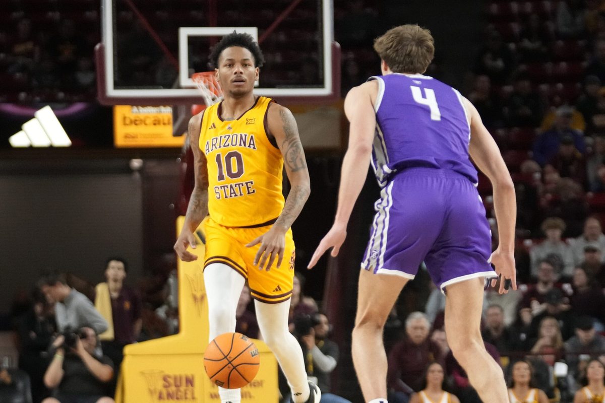 Nov 17, 2024; Tempe, Ariz., U.S.; Arizona State guard BJ Freeman (10) brings the ball up against St. Thomas guard Nolan Minessale (4) during the first half at Desert Financial Arena. Mandatory Credit: Michael Chow-Arizona Republic