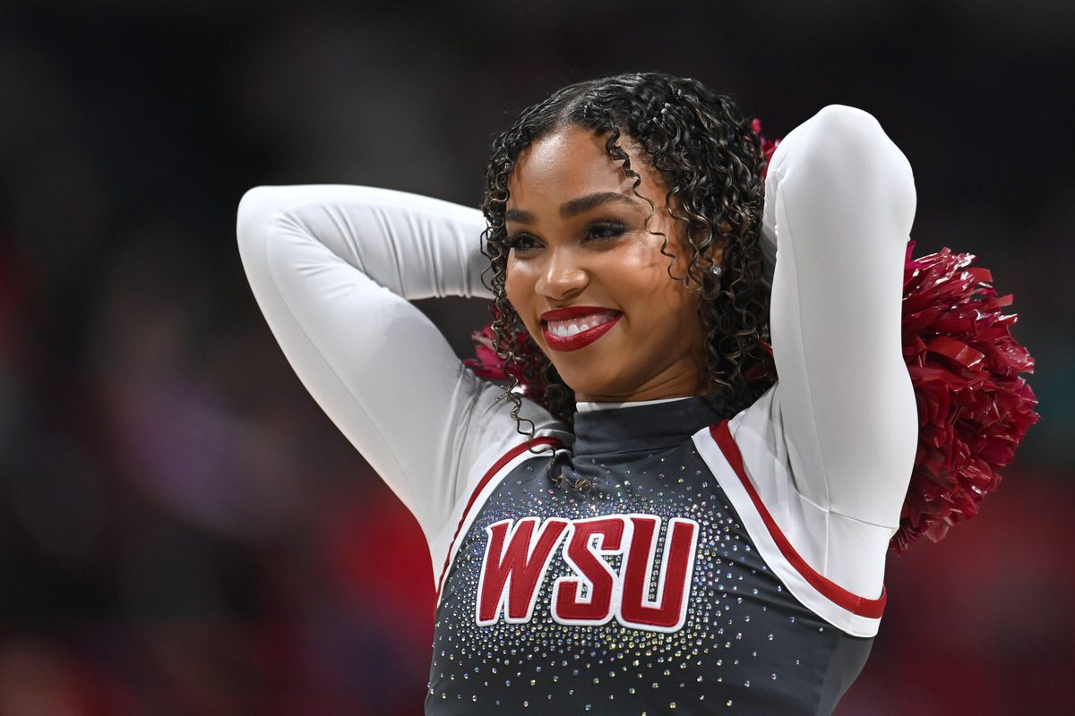 Nov 21, 2024; Spokane, Washington, USA; Washington State Cougars cheerleader performs against the Eastern Washington Eagles in the second half at Spokane Veterans Memorial Arena. Mandatory Credit: James Snook-Imagn Images