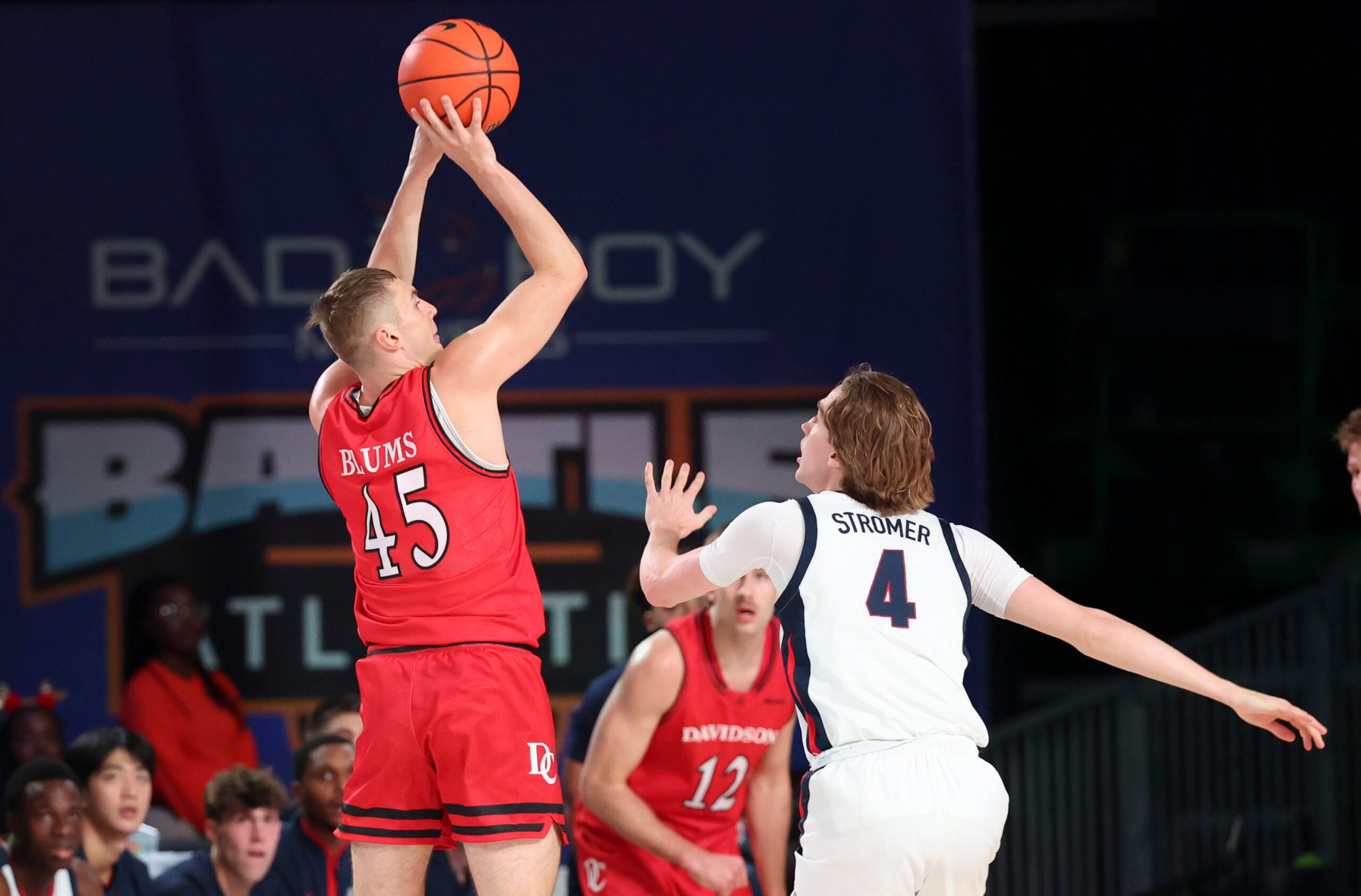 Nov 29, 2024; Paradise Island, Bahamas, BHS;  Davidson Wildcats guard Roberts Blums (45) shoots over Gonzaga Bulldogs guard Dusty Stromer (4) during the first half at Imperial Arena at the Atlantis resort.  Mandatory Credit: Kevin Jairaj-Imagn Images