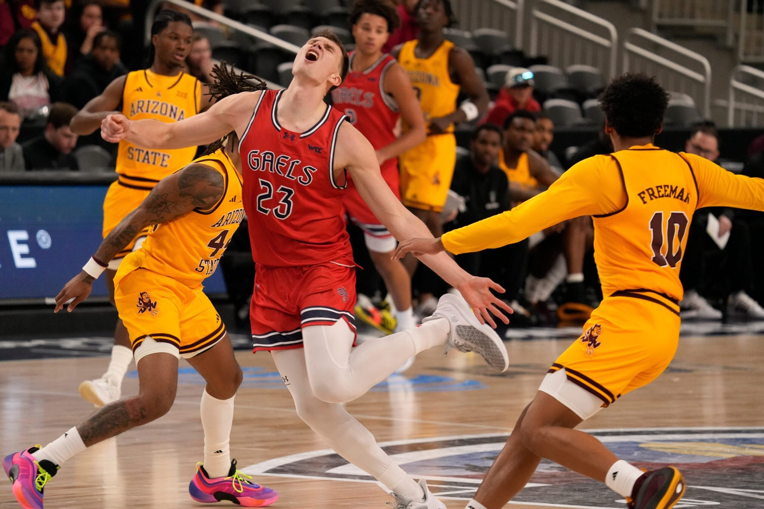 Paulius Murauskas, 23, of Saint Mary's College seems to come up with a small injury while playing against Arizona State University during the 2024 Acrisure Men's Classic in Palm Desert, Calif., Nov. 29, 2024.