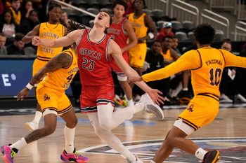 Paulius Murauskas, 23, of Saint Mary's College seems to come up with a small injury while playing against Arizona State University during the 2024 Acrisure Men's Classic in Palm Desert, Calif., Nov. 29, 2024.