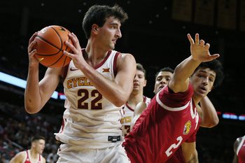 Iowa State Cyclones forward Milan Momcilovic (22) looks for pass as IU Indianapolis Jaguars forward DeSean Goode (2) defends during the second half in the NCAA men’s basketball at Hilton Coliseum on Monday, Nov. 18, 2024, in Ames, Iowa.