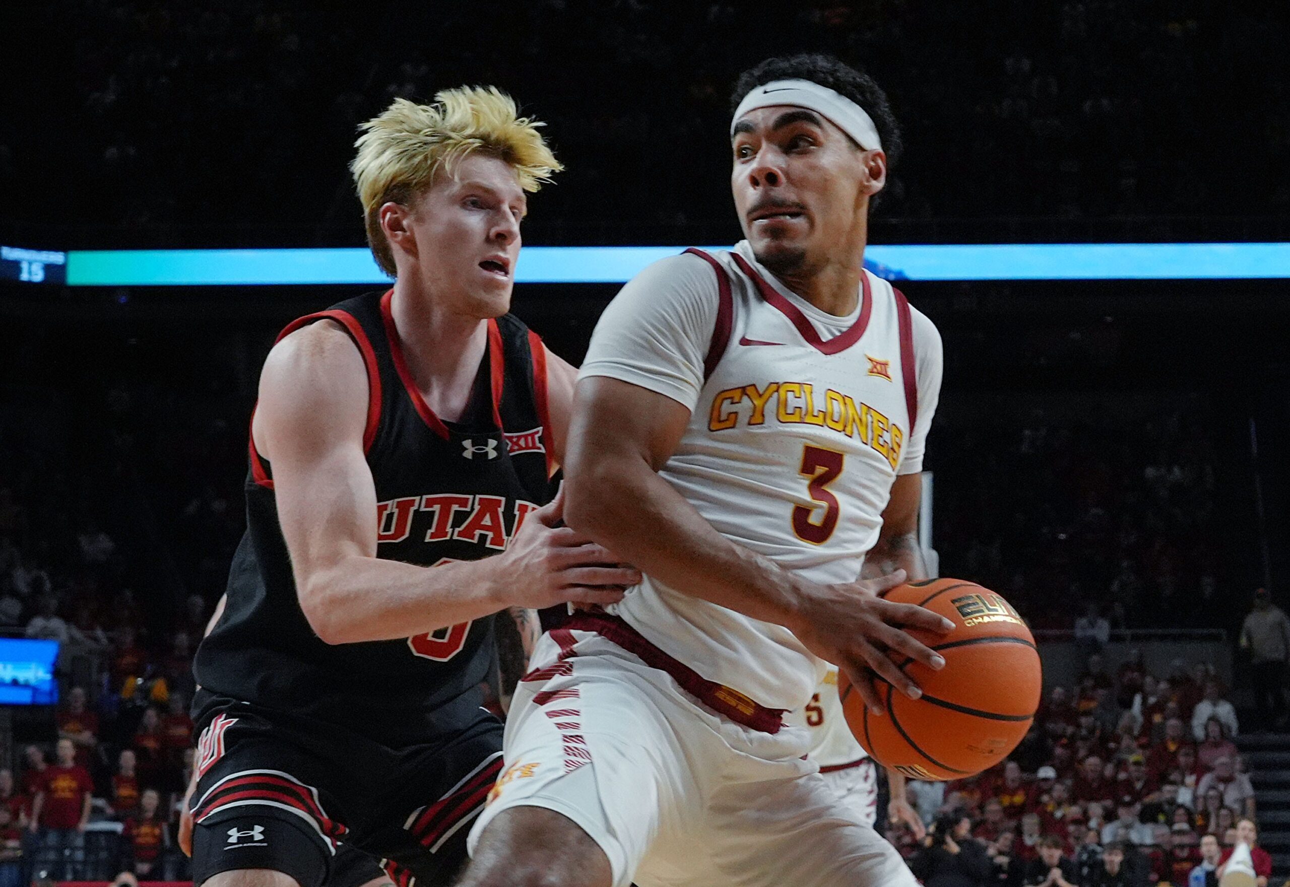 Iowa State Cyclones guard Tamin Lipsey (3) looks drive with the ball Utah Utes guard Hunter Erickson(0) during the second half in the Big-12 men’s basketball at Hilton Coliseum on Jan. 7, 2025 in Ames, Iowa.