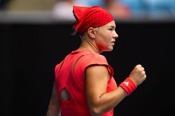 Jan 17, 2025; Melbourne, Victoria, Australia; Diana Shnaider celebrates during her match against Donna Vekic of Croatia in the third round of the women's singles at the 2025 Australian Open at Melbourne Park. Mandatory Credit: Mike Frey-Imagn Images