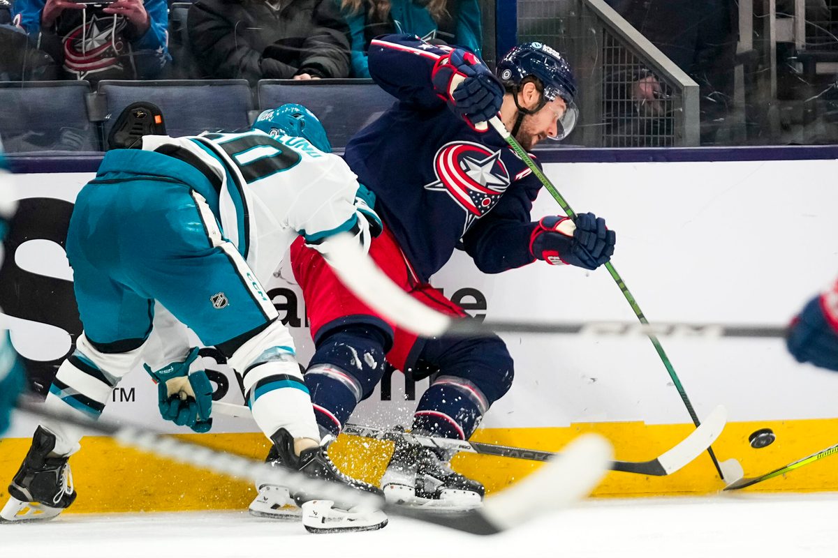 Jan 16, 2025; Columbus, Ohio, USA; Columbus Blue Jackets center Sean Kuraly (7) fights for the puck against the San Jose Sharks in the third period at Nationwide Arena on Thursday, Jan. 16, 2025 in Columbus, Ohio. Mandatory Credit: Samantha Madar/USA TODAY Network via Imagn Images