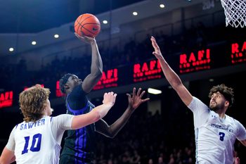 GCU forward Lök Wur (5) shoots a floater against ACU forward Leonardo Bettiol (3) during a game at Grand Canyon University on Jan. 16, 2025, in Phoenix.