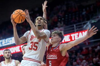 Bradley’s Darius Hannah (35) gets past UIC’s Modestas Kancleris in the second half of their MVC basketball game Wednesday, Jan. 29, 2025 at Carver Arena in Peoria. The Braves fell 93-70 to the Flames.