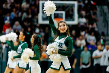 Jan 30, 2025; New Orleans, Louisiana, USA; Tulane Green Wave cheerleaders perform on a time out against the Memphis Tigers during the second half at Avron B. Fogelman Arena in Devlin Fieldhouse. Mandatory Credit: Stephen Lew-Imagn Images
