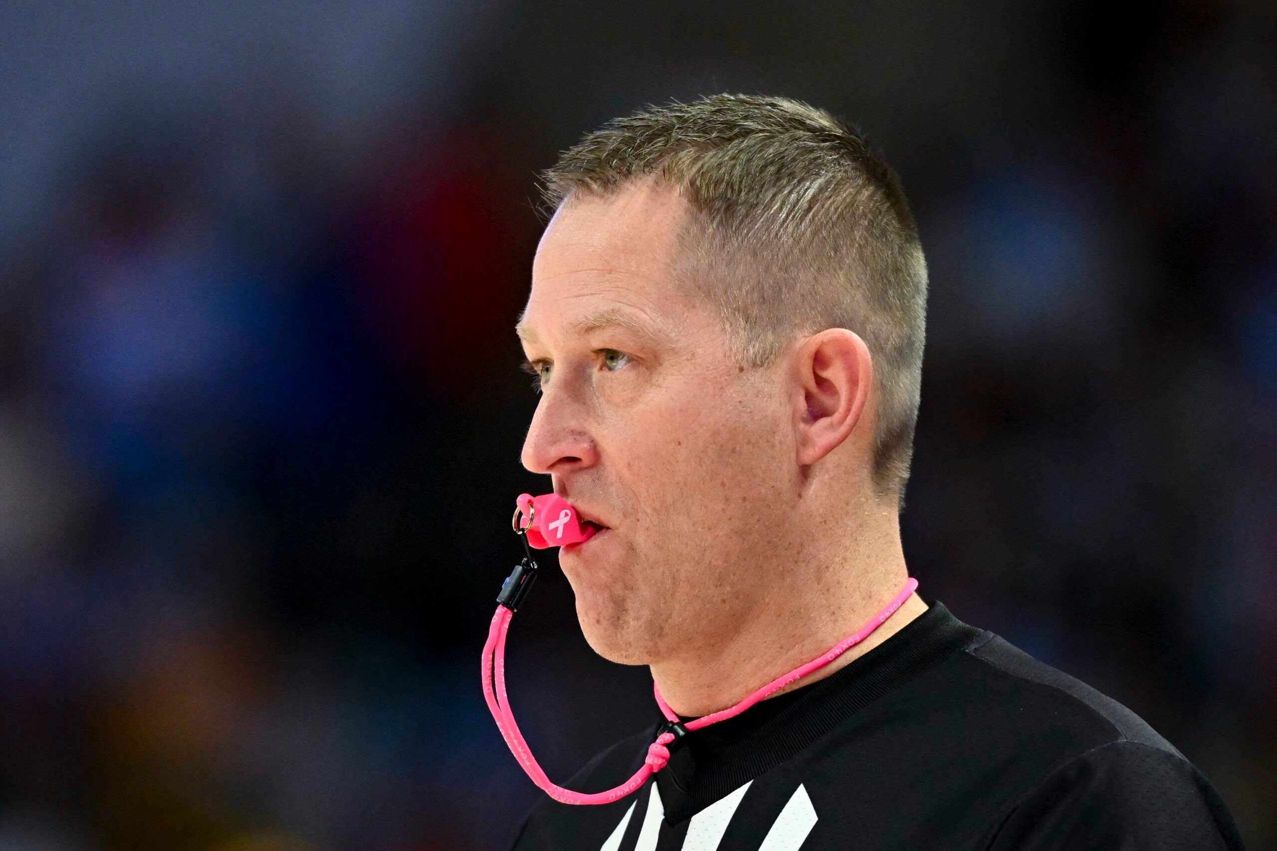 Feb 1, 2025; Houston, Texas, USA; A detailed view of a cancer awareness whistle on referee Tyler Kumpf during the game between the Houston Cougars and the Texas Tech Red Raiders at Fertitta Center. Mandatory Credit: Maria Lysaker-Imagn Images
