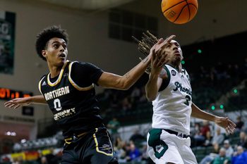 Northern Kentucky's Dan Gherezgher (0) and UWGB’s Jeremiah Johnson (3) fight for a rebound on Friday, February 14, 2025, at the Kress Center in Green Bay, Wis. Northern Kentucky won the game, 73-60, extending the Phoenix’s losing streak to 21 games.
Tork Mason/USA TODAY NETWORK-Wisconsin