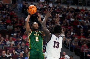 March 10, 2025; Las Vegas, NV, USA; San Francisco Dons center Carlton Linguard Jr. (2) shoots the basketball against Gonzaga Bulldogs forward Graham Ike (13) during the second half in the semifinal of the West Coast Conference tournament at Orleans Arena. Mandatory Credit: Kyle Terada-Imagn Images