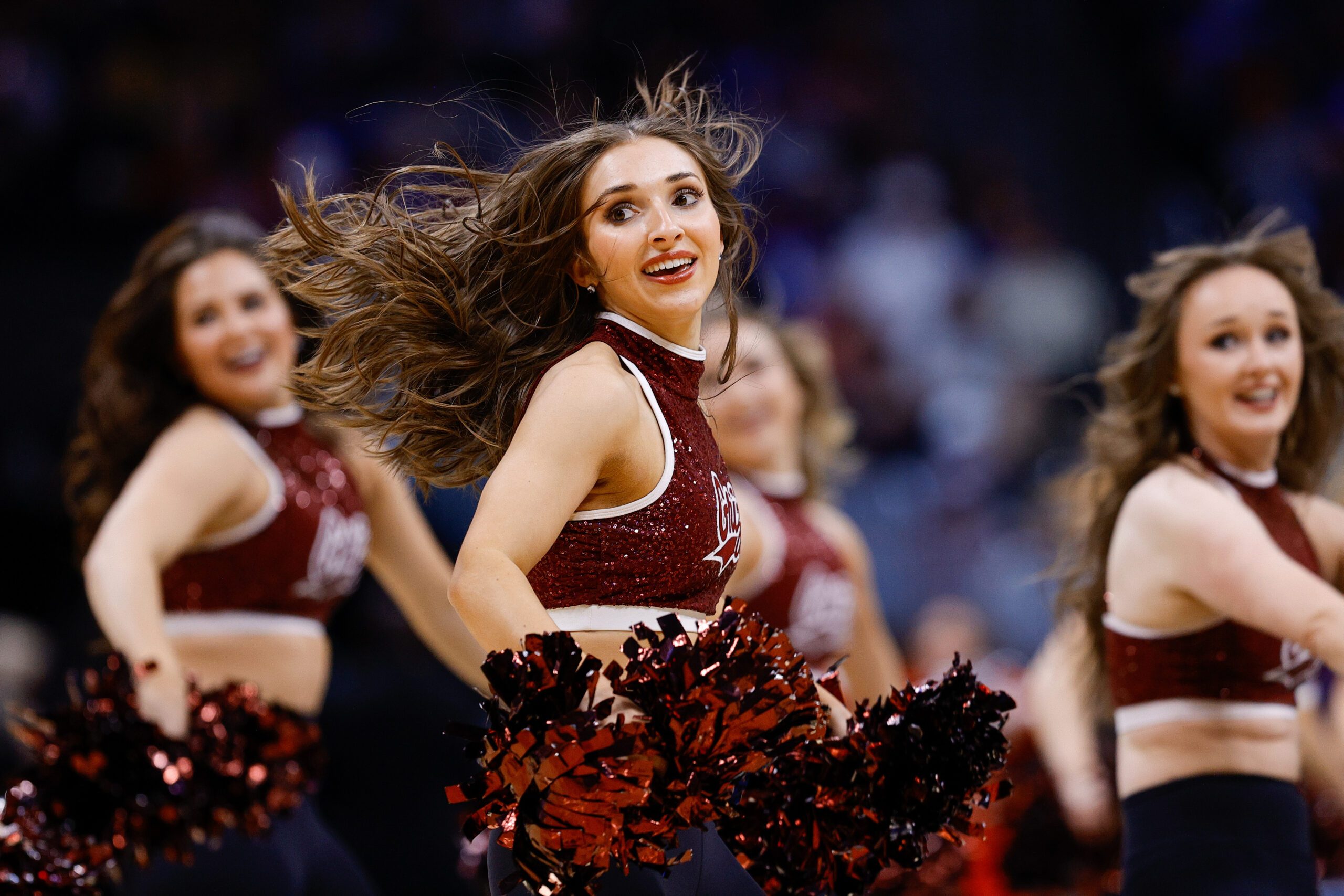 Mar 20, 2025; Denver, CO, USA; Montana Grizzlies cheerleaders perform during the second half between the Wisconsin Badgers and the Montana Grizzlies in the first round of the NCAA Tournament at Ball Arena. Mandatory Credit: Isaiah J. Downing-Imagn Images