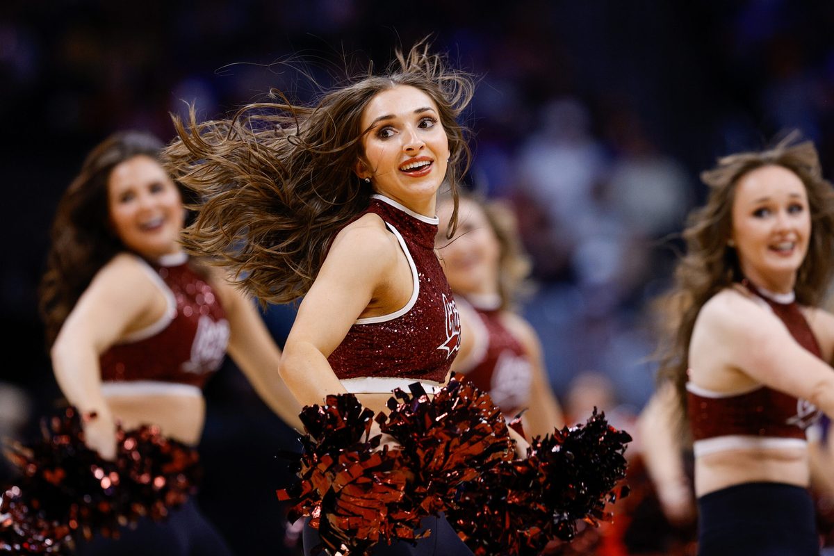 Mar 20, 2025; Denver, CO, USA; Montana Grizzlies cheerleaders perform during the second half between the Wisconsin Badgers and the Montana Grizzlies in the first round of the NCAA Tournament at Ball Arena. Mandatory Credit: Isaiah J. Downing-Imagn Images