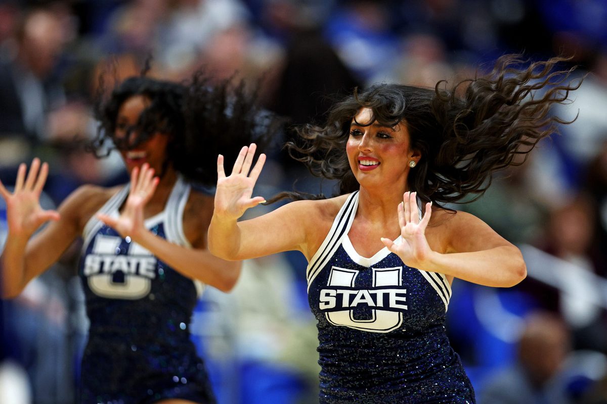 Mar 20, 2025; Lexington, KY, USA; The Utah State Aggies cheerleaders during the second half of the game between the UCLA Bruins and the Utah State Aggies in the first round of the NCAA Tournament at Rupp Arena. Mandatory Credit: Jordan Prather-Imagn Images