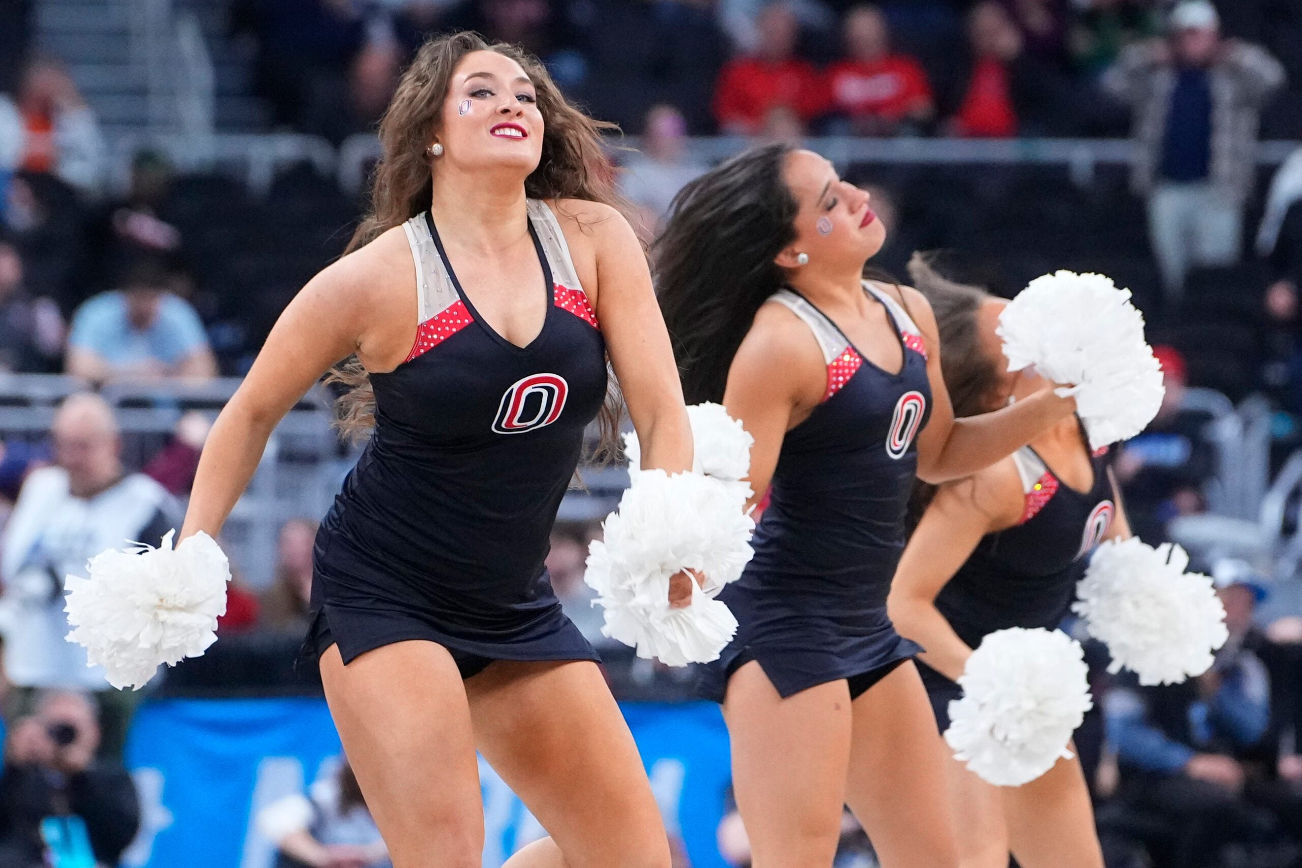 Mar 20, 2025; Providence, RI, USA;  Omaha Mavericks cheerleaders on the court between play during the second half against the St. John's Red Storm at Amica Mutual Pavilion. Mandatory Credit: Gregory Fisher-Imagn Images