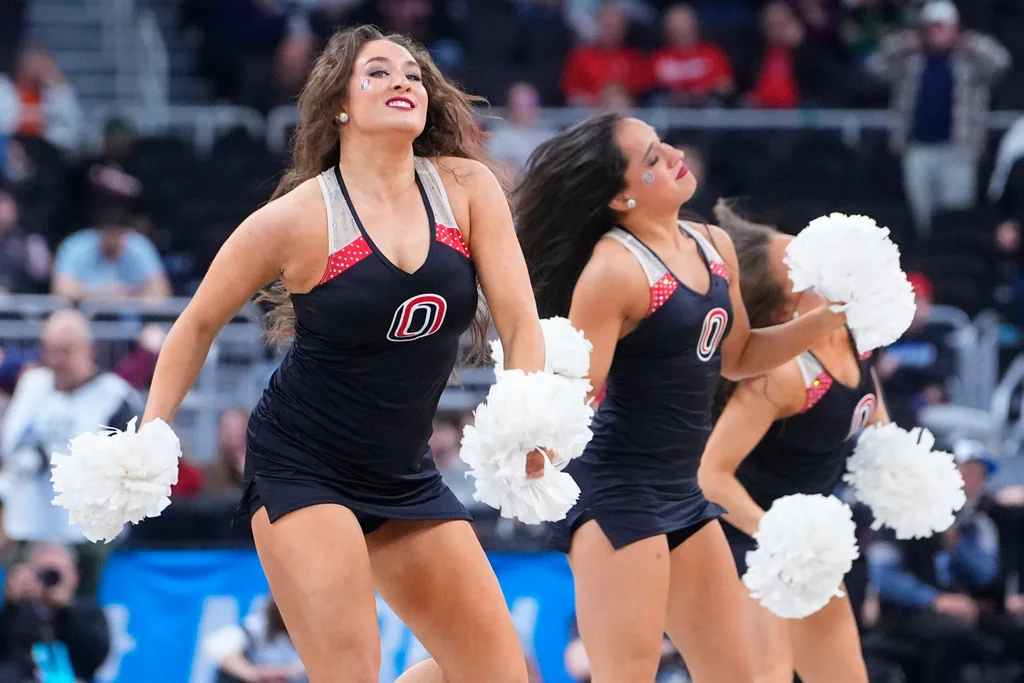 Mar 20, 2025; Providence, RI, USA; Omaha Mavericks cheerleaders on the court between play during the second half against the St. John's Red Storm at Amica Mutual Pavilion. Mandatory Credit: Gregory Fisher-Imagn Images