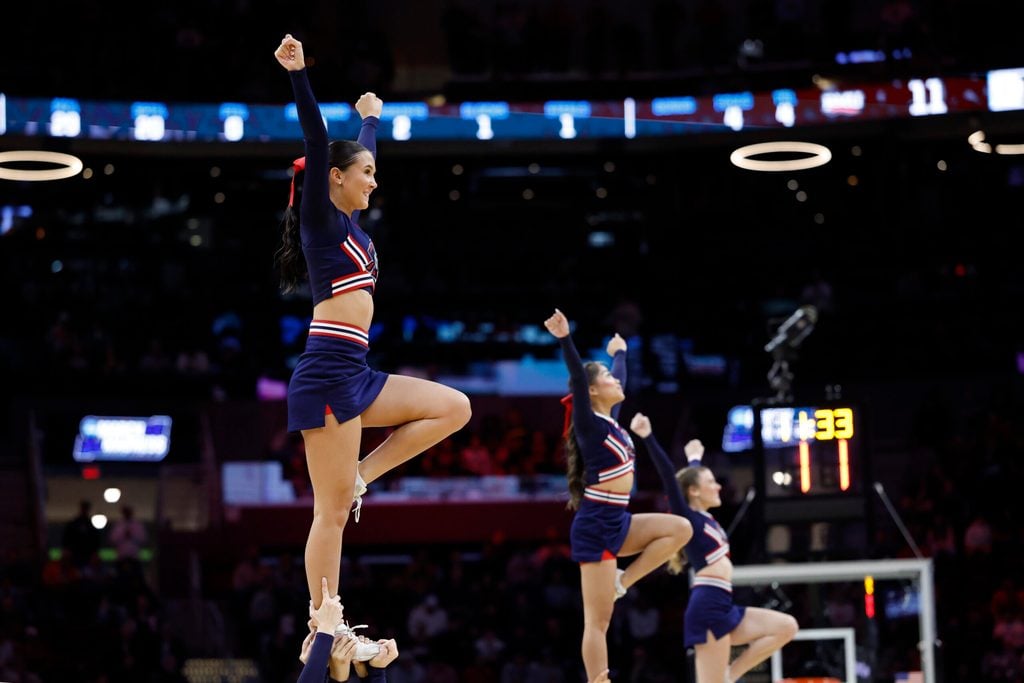 Mar 21, 2025; Cleveland, OH, USA; Robert Morris Colonials cheerleaders perform in the first half against the Alabama Crimson Tide during the NCAA Tournament First Round at Rocket Arena. Mandatory Credit: Rick Osentoski-Imagn Images