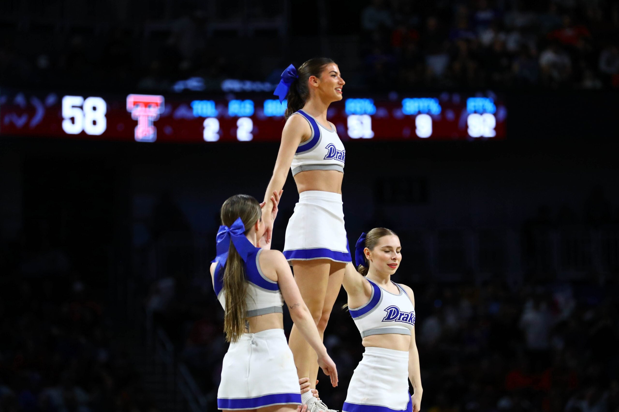 Mar 22, 2025; Wichita, KS, USA; Drake Bulldogs cheerleaders perform during the second half at Intrust Bank Arena. Mandatory Credit: Nick Tre. Smith-Imagn Images
