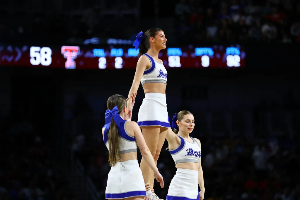 Mar 22, 2025; Wichita, KS, USA; Drake Bulldogs cheerleaders perform during the second half at Intrust Bank Arena. Mandatory Credit: Nick Tre. Smith-Imagn Images