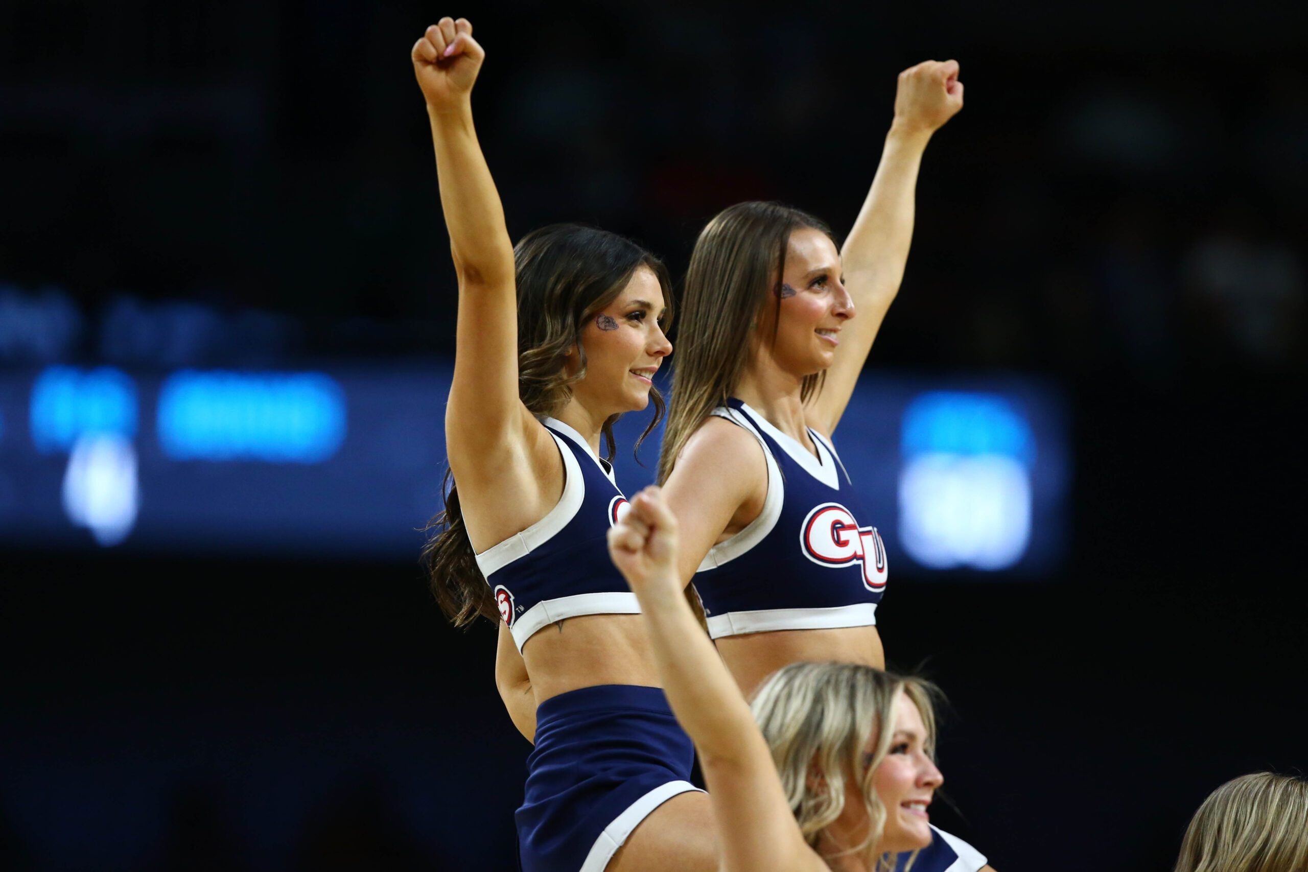 Mar 22, 2025; Wichita, KS, USA; Gonzaga Bulldogs cheerleaders perform during the first half at Intrust Bank Arena. Mandatory Credit: Nick Tre. Smith-Imagn Images