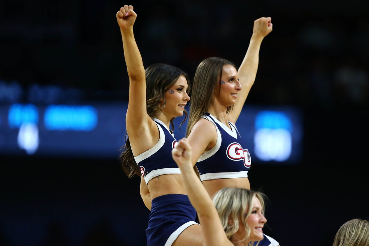 Mar 22, 2025; Wichita, KS, USA; Gonzaga Bulldogs cheerleaders perform during the first half at Intrust Bank Arena. Mandatory Credit: Nick Tre. Smith-Imagn Images