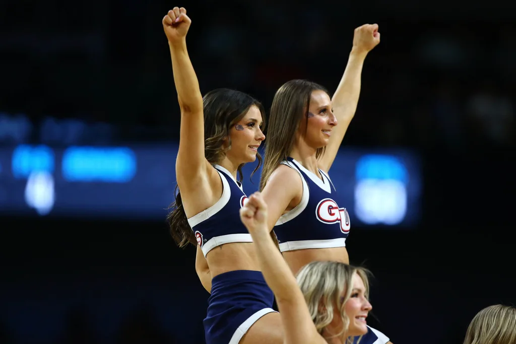 Mar 22, 2025; Wichita, KS, USA; Gonzaga Bulldogs cheerleaders perform during the first half at Intrust Bank Arena. Mandatory Credit: Nick Tre. Smith-Imagn Images