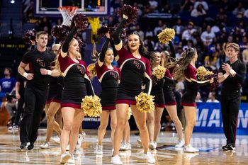 Mar 22, 2025; Baton Rouge, Louisiana, USA;  Florida State Seminoles cheerleaders on a time out against the George Mason Patriots during the second half at Pete Maravich Assembly Center. Mandatory Credit: Stephen Lew-Imagn Images