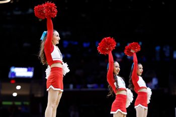 Mar 23, 2025; Cleveland, OH, USA; New Mexico Lobos cheerleaders perform in the first half against the Michigan State Spartans during the NCAA Tournament Second Round at Rocket Arena. Mandatory Credit: Rick Osentoski-Imagn Images