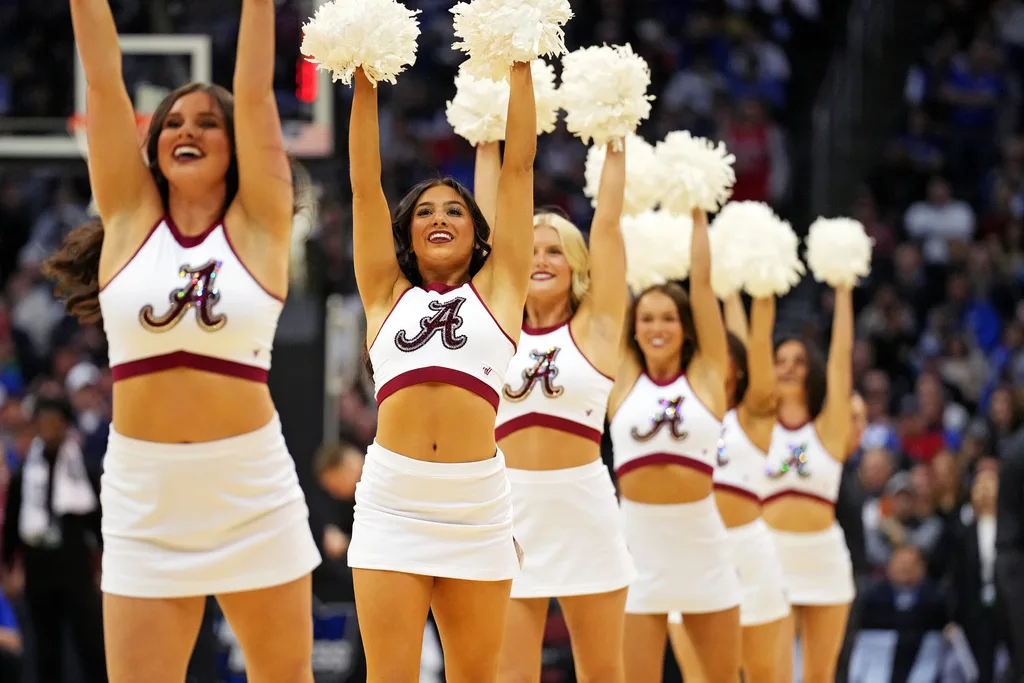 Mar 27, 2025; Newark, NJ, USA; The Alabama Crimson Tide cheerleader during the second half of an East Regional semifinal of the 2025 NCAA tournament between the Alabama Crimson Tide and the Brigham Young Cougars at Prudential Center. Mandatory Credit: Robert Deutsch-Imagn Images