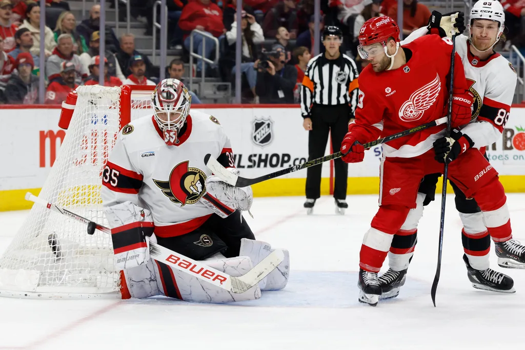 Mar 27, 2025; Detroit, Michigan, USA; Ottawa Senators goaltender Linus Ullmark (35) makes a save in the second period against the Detroit Red Wings at Little Caesars Arena. Mandatory Credit: Rick Osentoski-Imagn Images