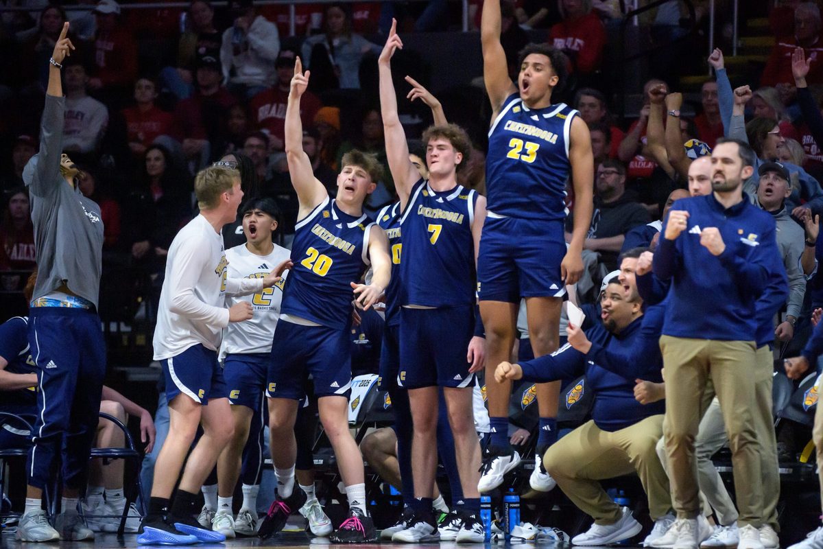 The Chattanooga bench erupts after a three-pointer gives them the lead over Bradley in the second half of their NIT quarterfinal basketball game Tuesday, March 25, 2025 at Carver Arena in Peoria. The Mocs advanced to the semifinals with a 67-65 win.