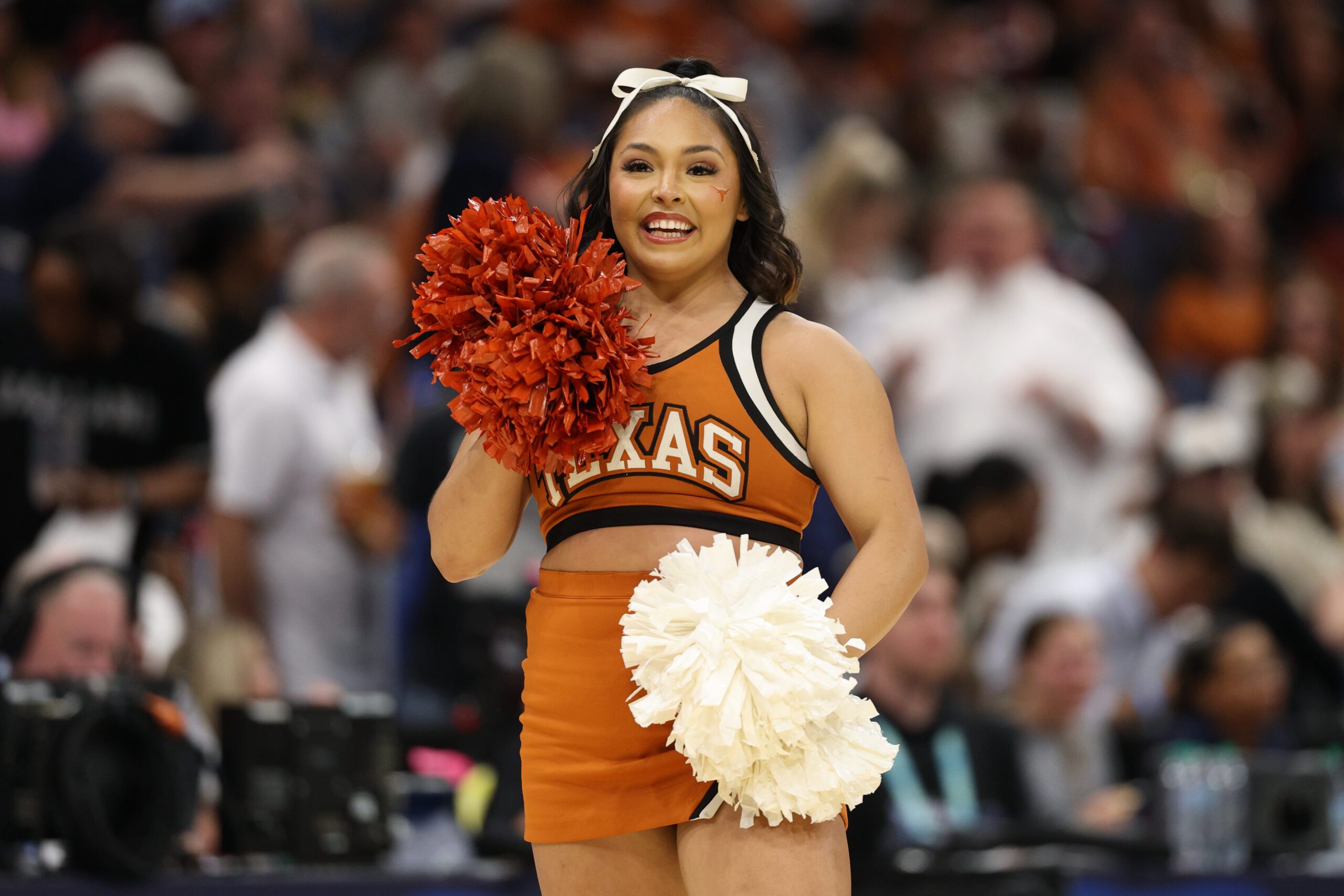 Apr 4, 2025; Tampa, FL, USA;  The Texas Longhorns cheerleaders perform during the third quarter in a semifinal of the women's 2025 NCAA tournament against the South Carolina Gamecocks at Amalie Arena. Mandatory Credit: Nathan Ray Seebeck-Imagn Images