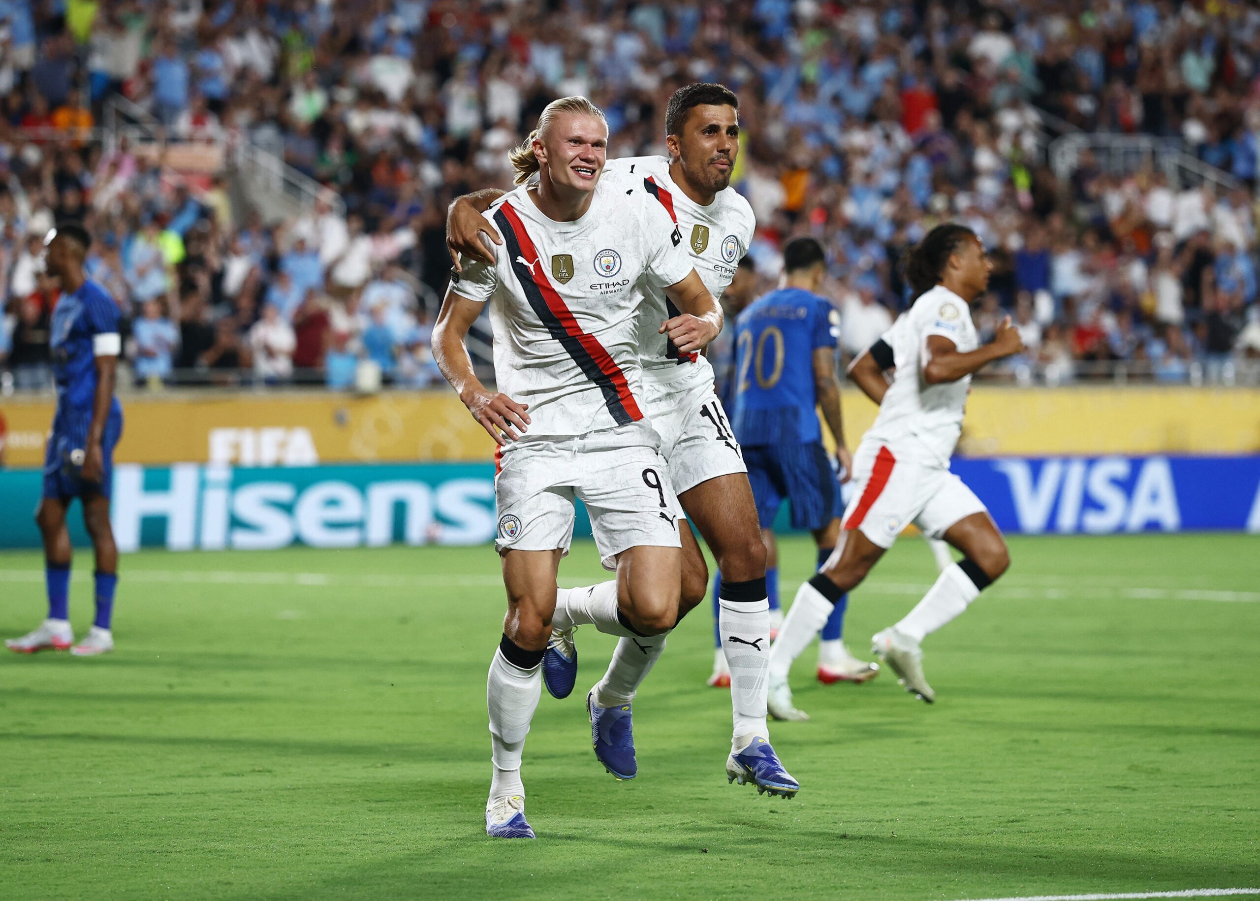 [Subscription Customers Only] Jun 30, 2025; Orlando, Florida, USA; Manchester City forward Erling Haaland (9) celebrates scoring their second goal with midfielder Rodri (16) during a round of 16 match of the 2025 FIFA Club World Cup at Camping World Stadium. Mandatory Credit: Lee Smith-Reuters via Imagn Images