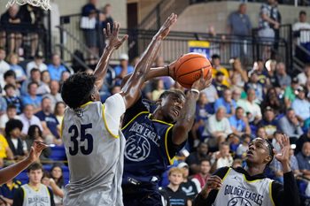 Marquette Golden Eagles forward Michael Phillips II (35) attempts to block Marquette Golden Eagles guard Sean Jones (22) during Marquette Men's Basketball open practice on Thursday July 31, 2025 at the Al McGuire Center in Milwaukee, WI.
