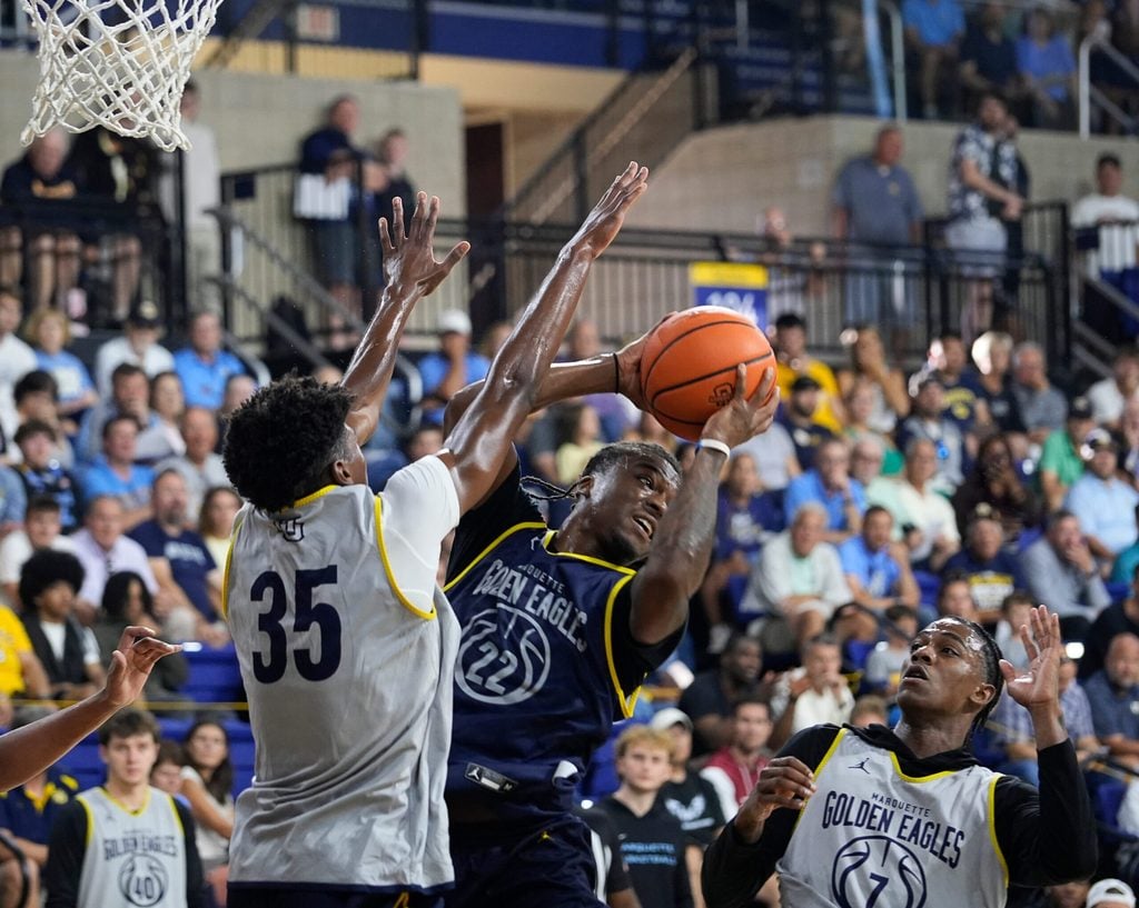 Marquette Golden Eagles forward Michael Phillips II (35) attempts to block Marquette Golden Eagles guard Sean Jones (22) during Marquette Men's Basketball open practice on Thursday July 31, 2025 at the Al McGuire Center in Milwaukee, WI.