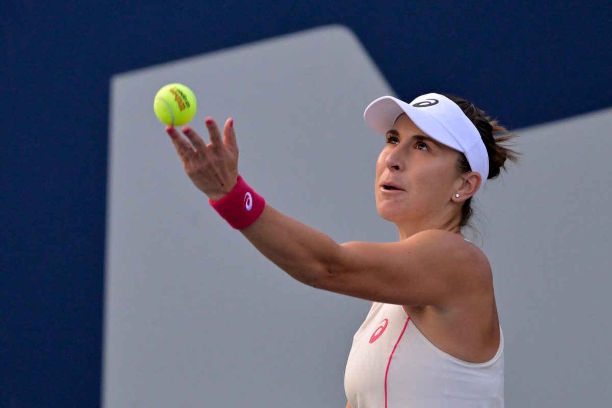 Aug 1, 2025; Montreal, QC, Canada; Belinda Bencic (SUI) serves against Karolina Muchova (CZE) in third round play at IGA Stadium. Mandatory Credit: Eric Bolte-Imagn Images