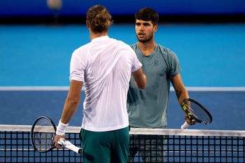 Carlos Alcaraz, of Spain, shakes the hand of Alexander Zverev, of Germany, after winning during the Cincinnati Open in Mason on Aug. 16, 2025.