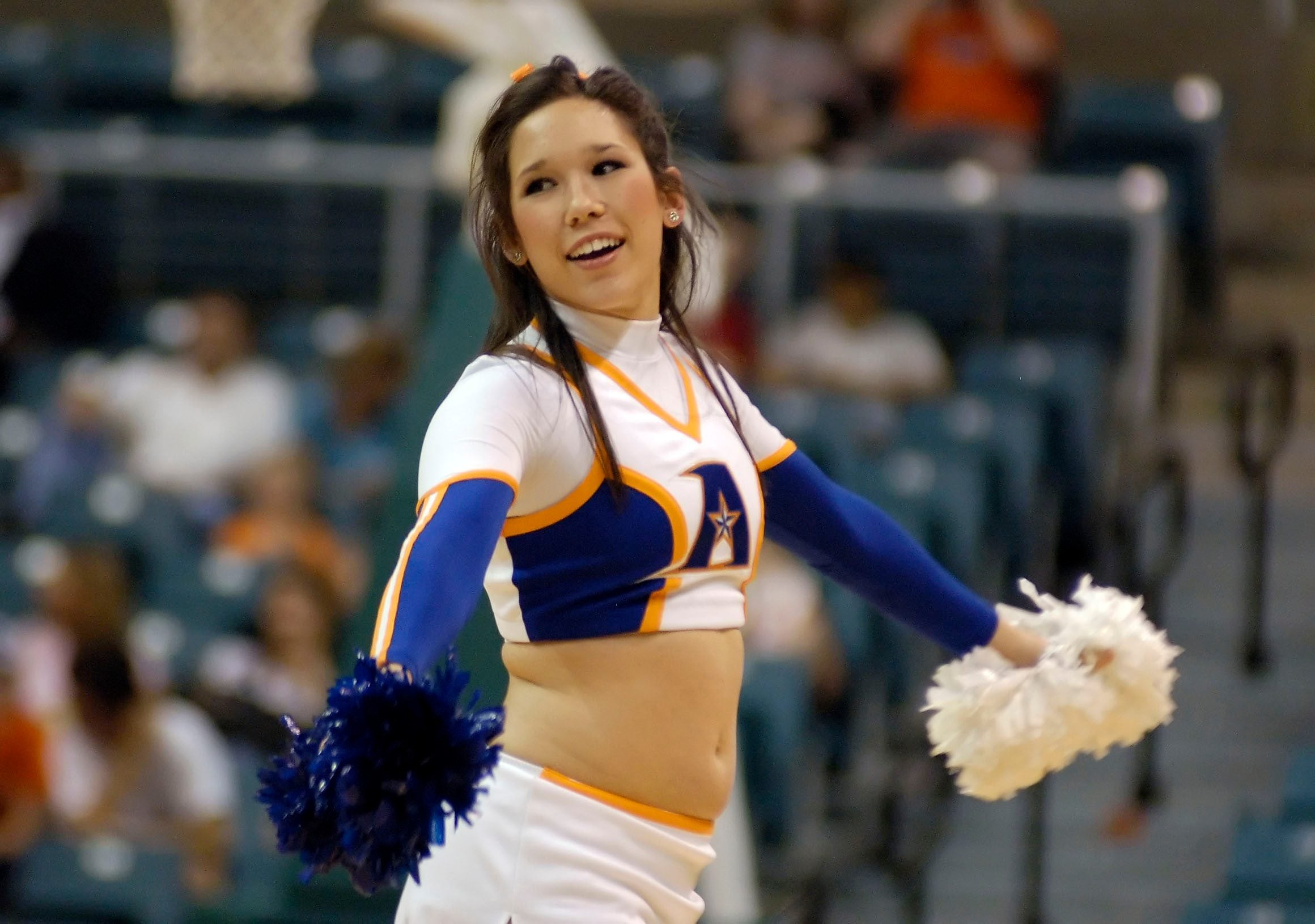 Mar 14, 2008; Katy, TX, USA; UT Arlington Mavericks cheerleader cheers on her team against the Sam Houston Bearkats in the second half of the Southland Conference Tournament at the Merrell Center. Mandatory Credit: Brett Davis-Imagn Images